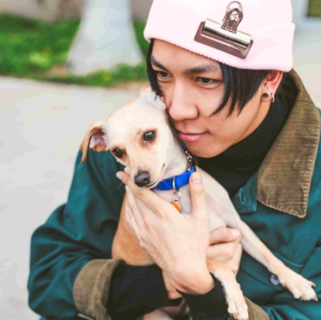 Man Small dog 1 scaled e1770348746578