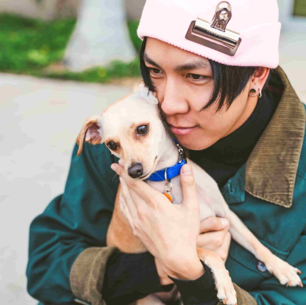 Man Small dog 1 scaled e1770348746578